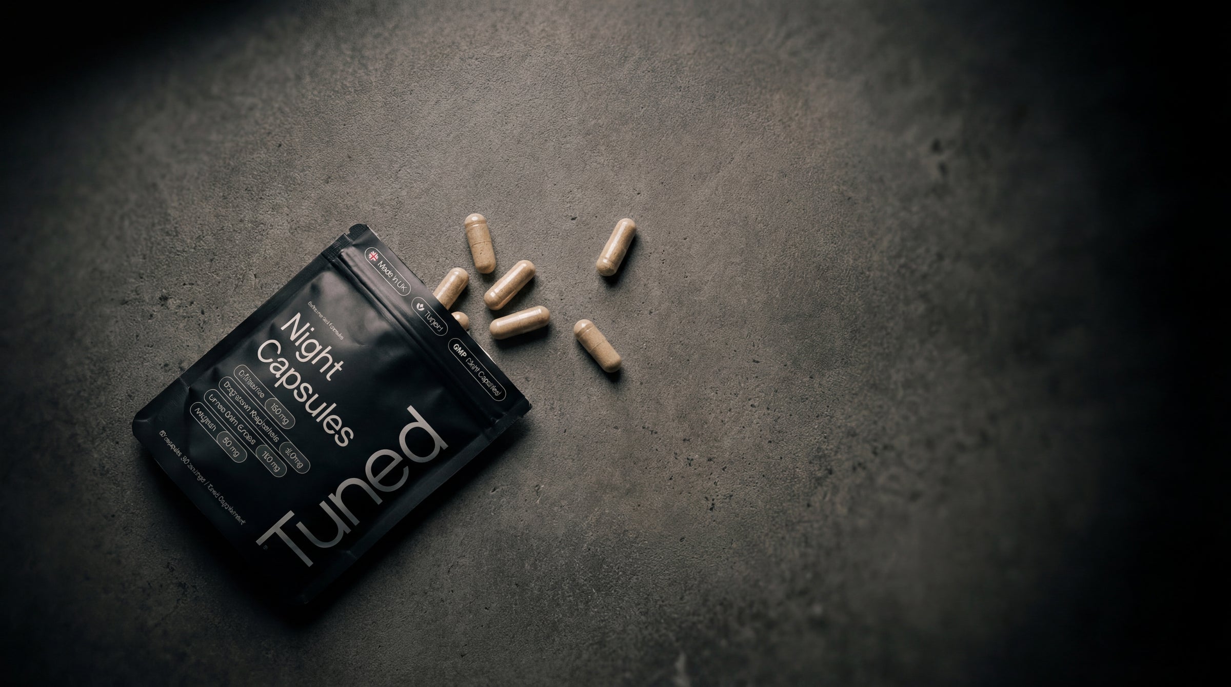 Tuned Night Capsules spilling from sachet